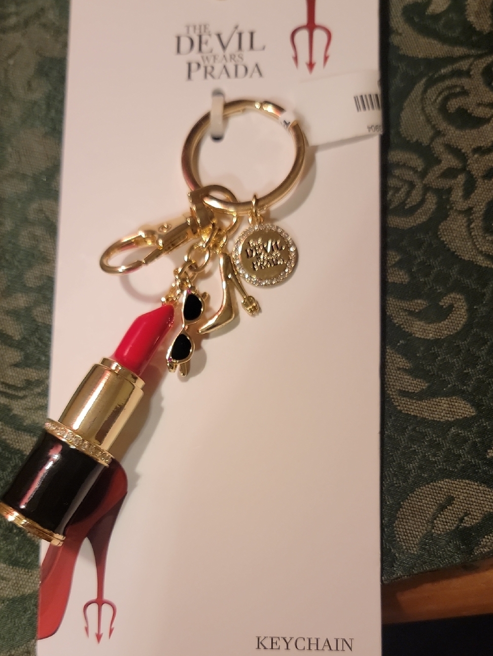 NWT The Devil Wear Prada Gold-Tone Charm Keyring / Bag Charm with Red Accent